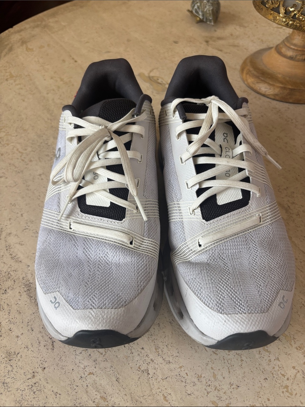 On Running Women’s Athletic Shoes in White with Black Accents